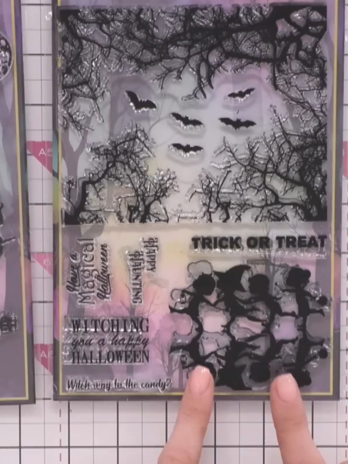 Step 1: Select a patterned paper from the Happy Haunting Reflection Collection to use as your card base. Choose a desi