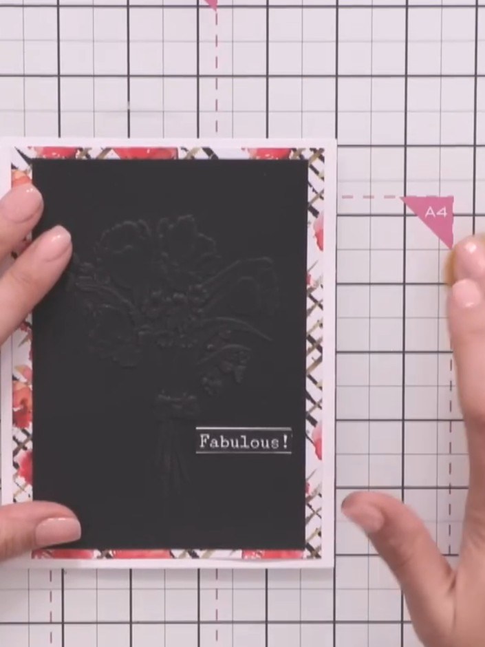 Step 1: Select a patterned paper from the Captured Elegance Poppy Collection to use as your base layer. Position the b