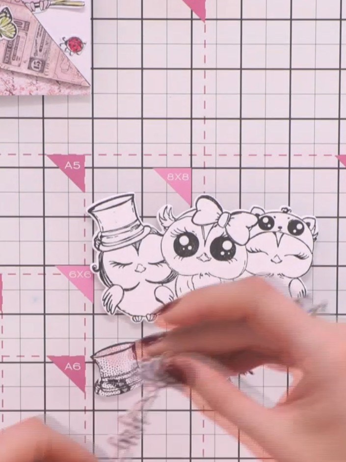 Step 5: Score the back of one of the owl die-cut pieces. Apply glue to the scored area and attach it to the second owl