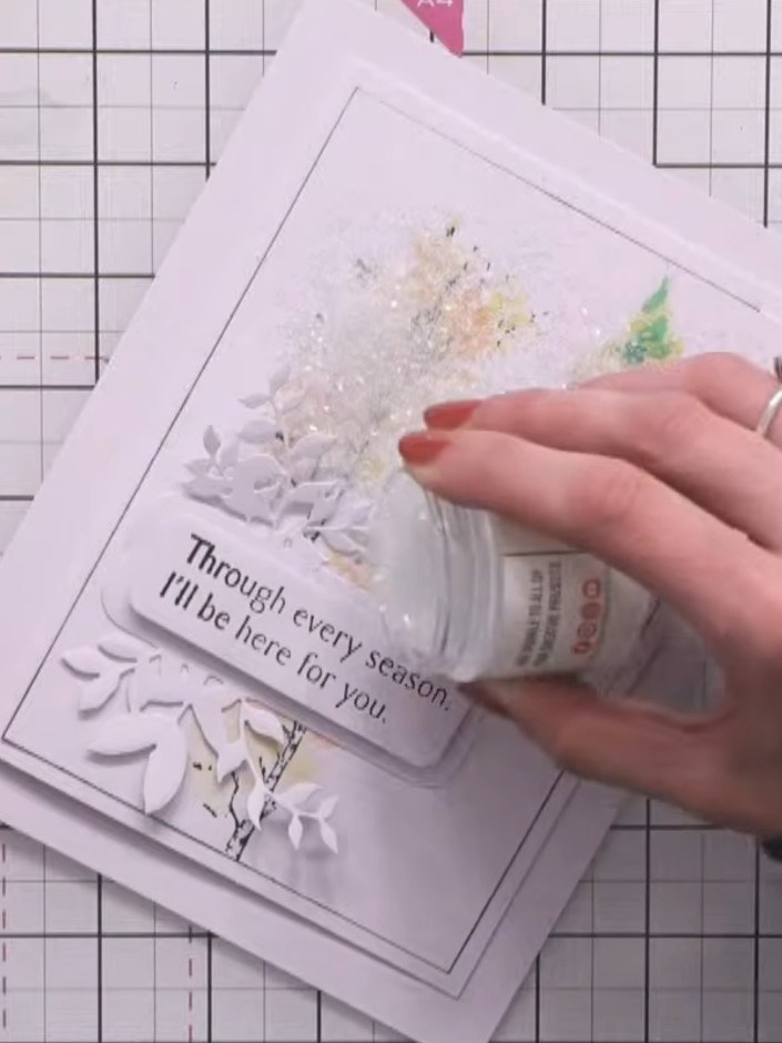 Step 11: Apply chunky colourless glitter glue to the watercoloured trees to add crystal-clear shimmer. Allow the glue t