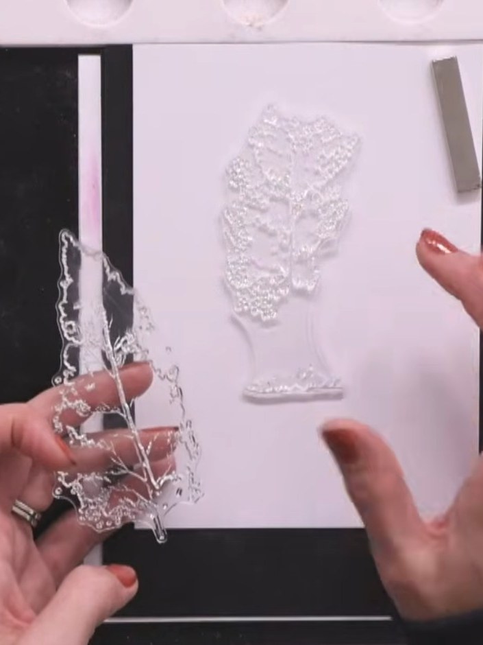Step 2: Position the stamped tree elements onto your card front. Arrange them with one element slightly lower than the