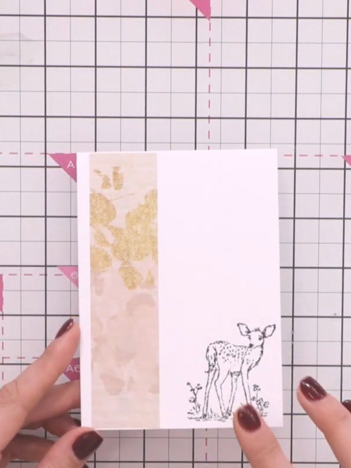 Step 6: Position the lime leaf die-cut panel down the left side of the card front to frame the stamped deer image. The