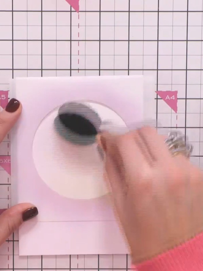 Step 6: Apply yellow ink softly all the way around the exterior of the circle. Add a darker colour to the top half to 