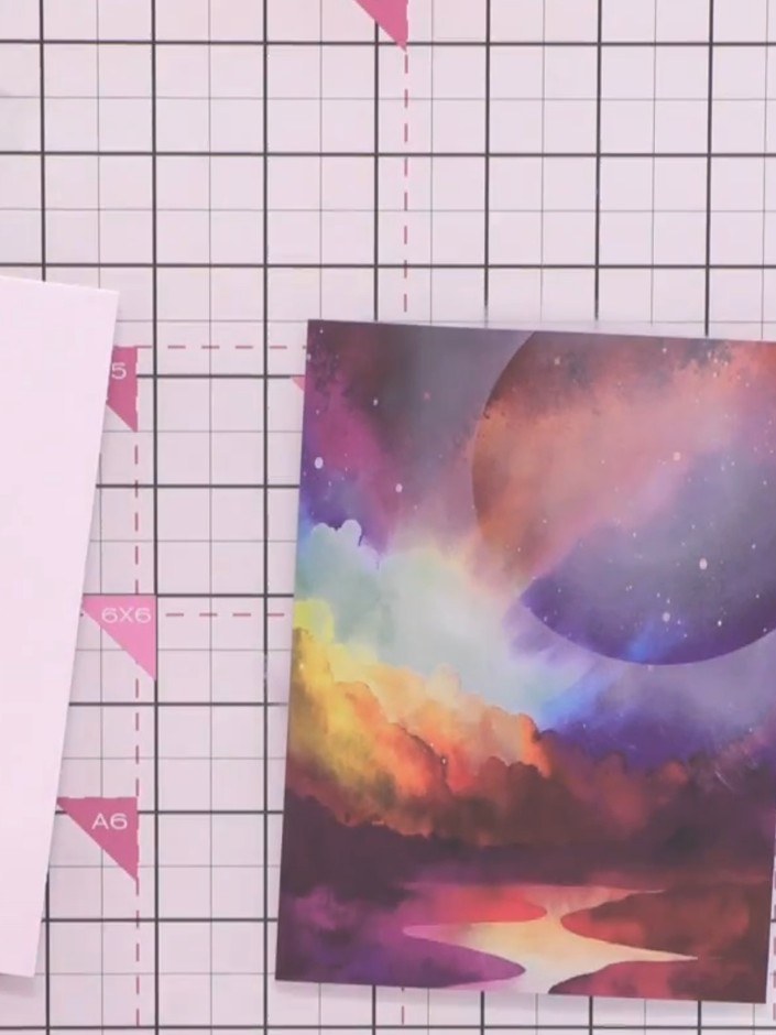 Step 5: Using your finger or a blending tool, gently blend the white ink outwards from the moon area to soften the edg