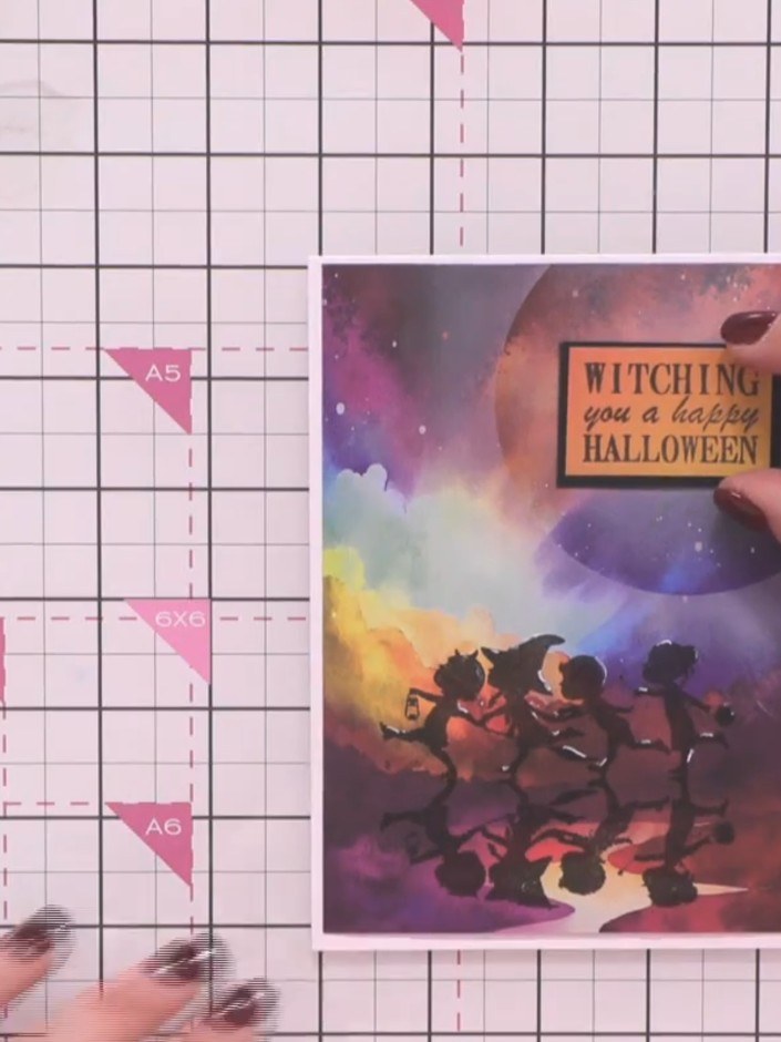 Step 9: Add a sentiment to complete your card. Attach a Halloween greeting such as 'Witching you a happy Halloween' to