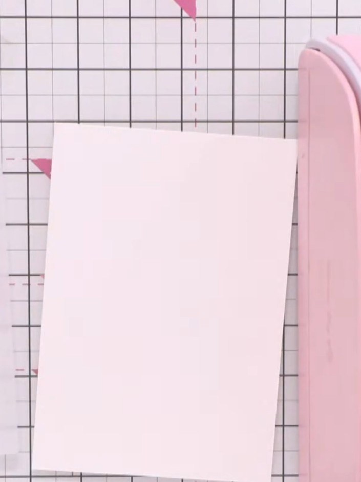 Step 2: Place your watercolour cardstock into the embossing folder, positioning it further down the plate to allow the