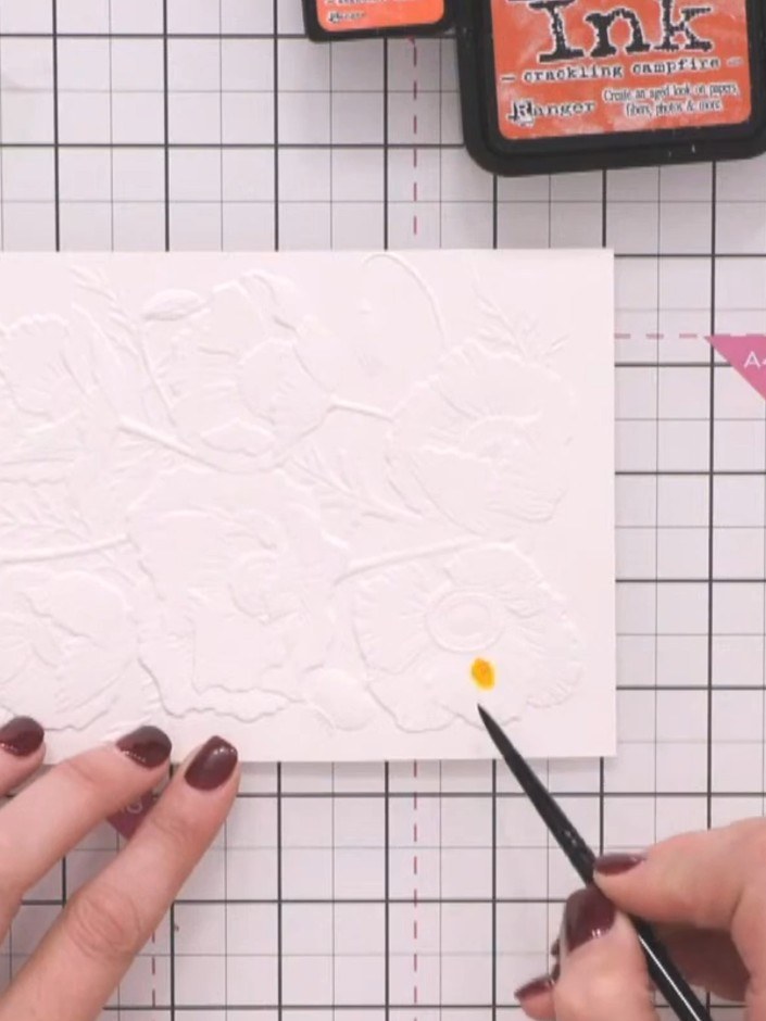 Step 6: Pounce the side of your brush gently over the wet petal to distribute the colour evenly across the embossed li