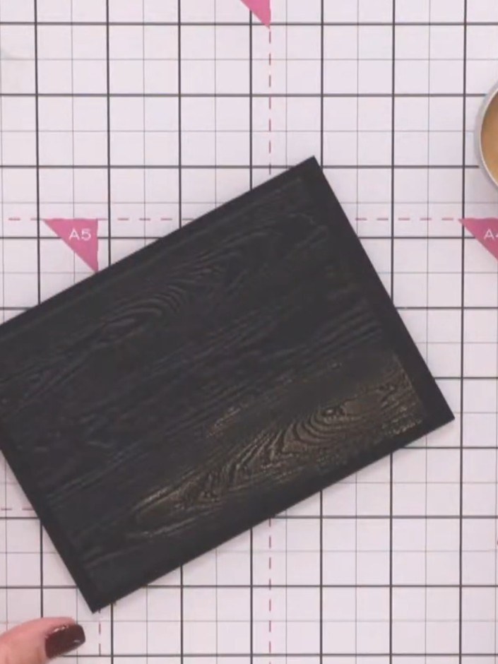 Step 3: Pick up a small amount of gilding wax on your fingertip. Tap your finger onto the craft mat to distribute the 