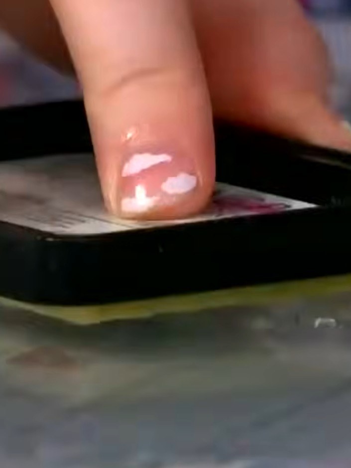 Step 2: Apply anti-static powder to the vellum sheet using an anti-static pad. Gently tap the pad across the entire su