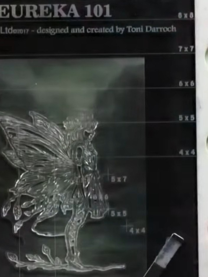 Step 5: Press the fairy stamp onto the vellum using a tippy-tapping motion to ensure all elements of the design are ca