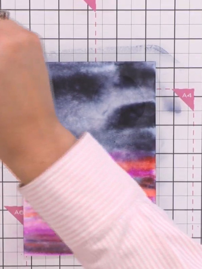 Step 8: Add more water to the moon area using a brush. Dab gently with tissue to lift out additional colour and enhanc