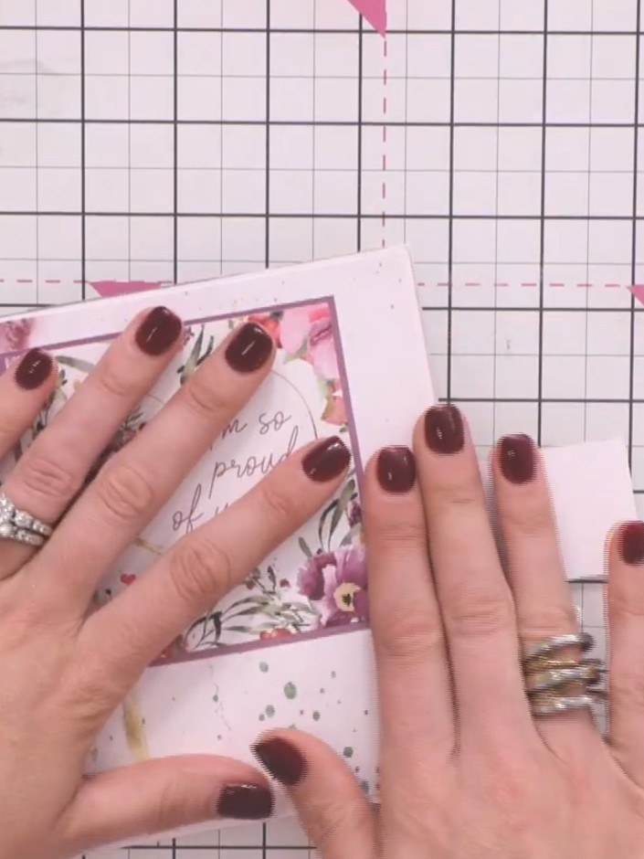 Step 15: Adhere the closure strip to the back of your album using glue at the top and bottom only. Leave the middle sec