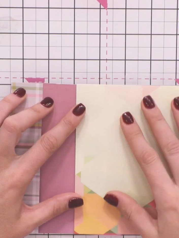 Step 7: Score a line approximately 2 inches from the edge of your patterned paper. Fold along the scored line and adhe