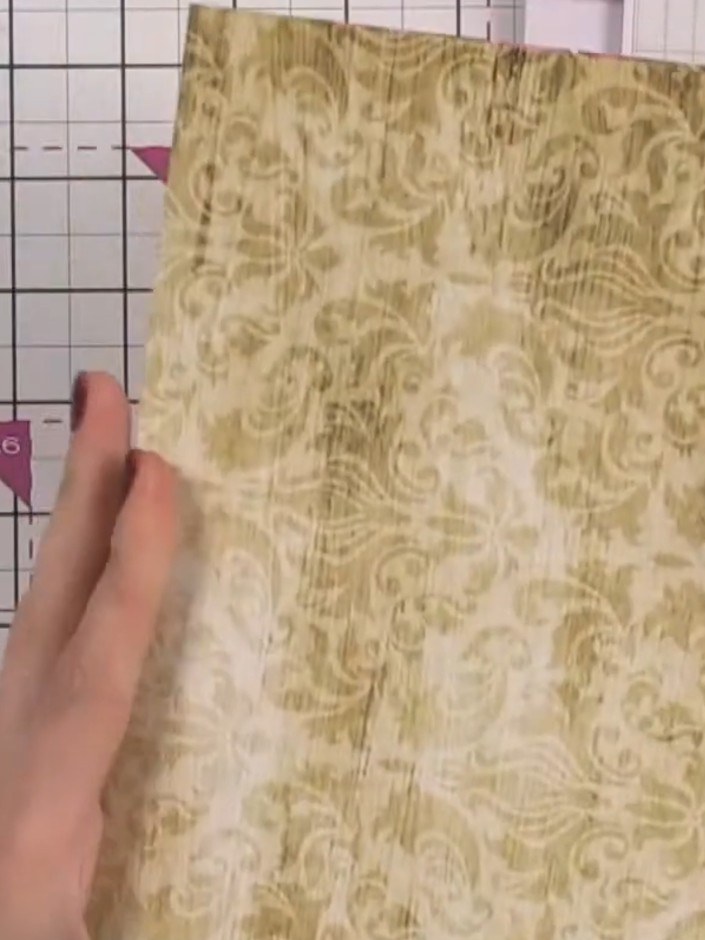 Step 2: Cut the 12 by 12 inch decorative paper sheet down to 12 by 8 inches using a guillotine or craft knife and rule