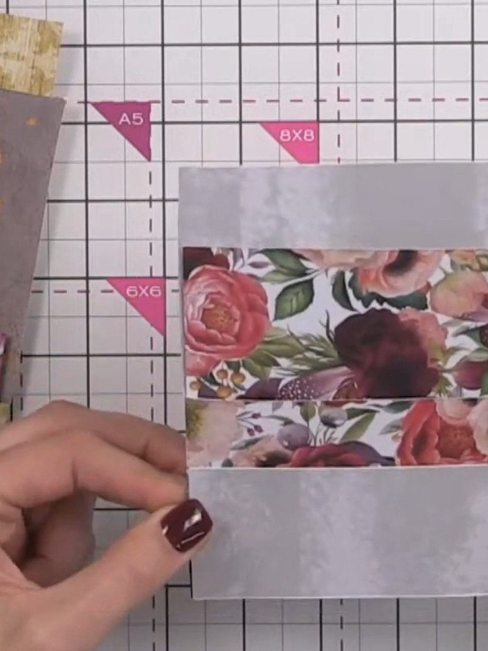 Step 8: Fold the second flap down over the floral paper. Apply glue along the base and side edge of the flap, then pre