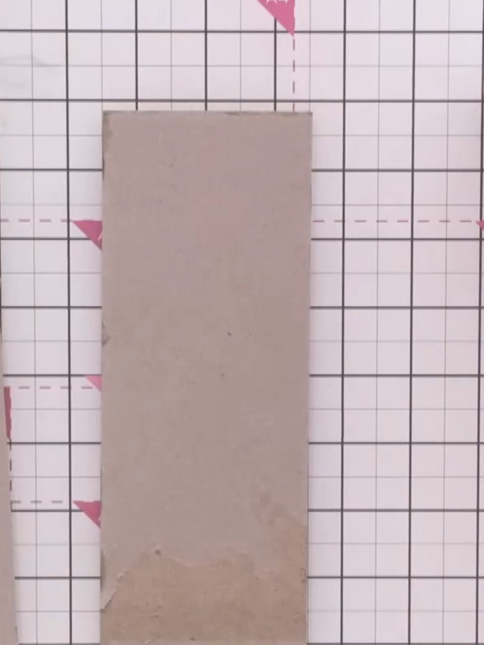 Step 1: Cut two pieces of white cardstock to match the size of your embossing folder. These will be used to create the