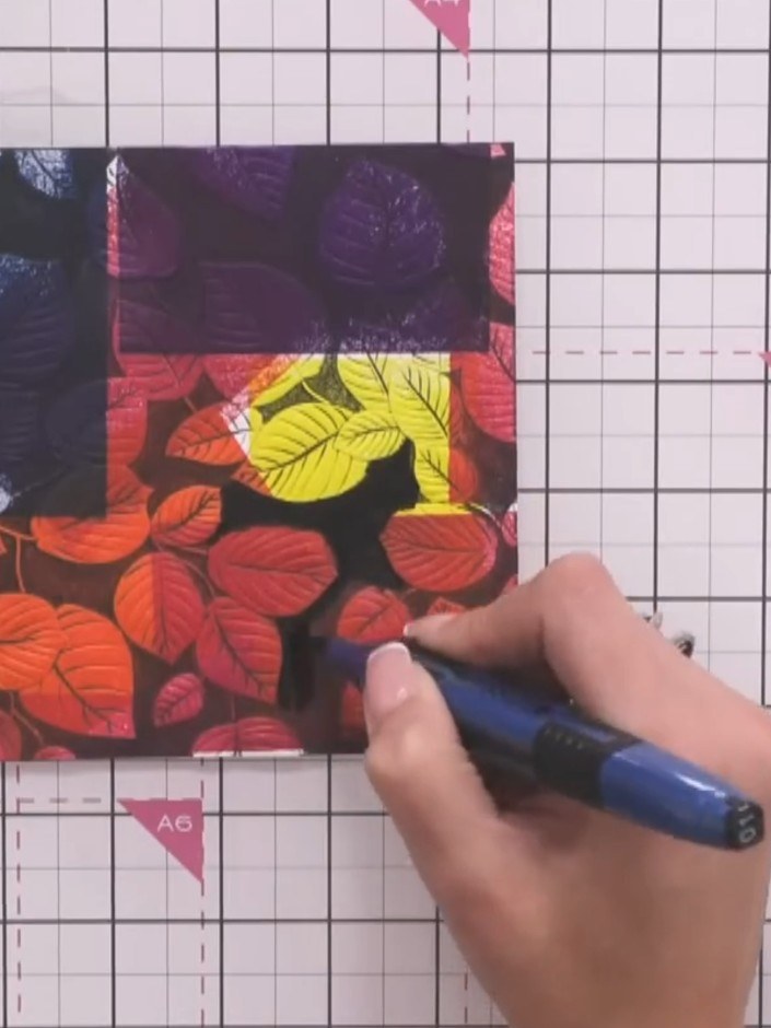Step 6: Using a black alcohol marker or fine liner pen, carefully colour around the embossed leaf design to define and