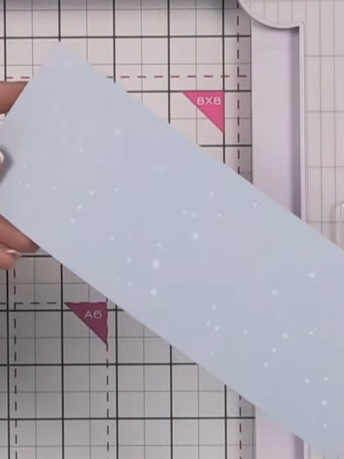 Step 4: Cut three strips of patterned paper from your 8x8 inch sheets at 3 inches wide to create your hinge system pie