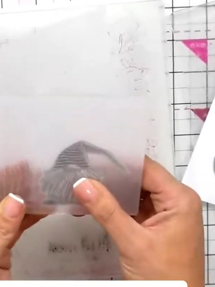 Step 7: Run the cut gnome through the 3D embossing folder, carefully lining it up with the image on the front to creat