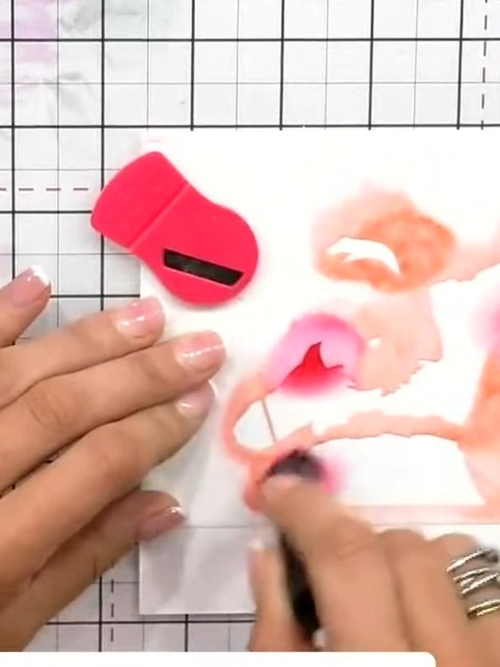 Step 1: Position the first layering stencil over your card base. Pounce pink and yellow ink through the stencil using 