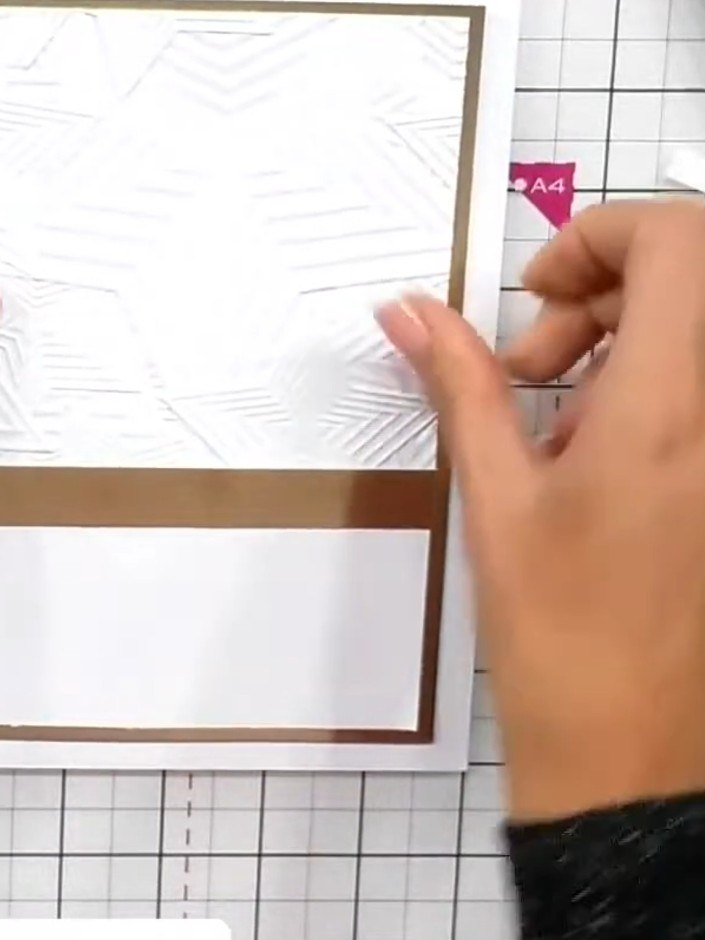 Step 9: Position and mount your embossed focal image onto the card base. The embossed panel should be centred on the k