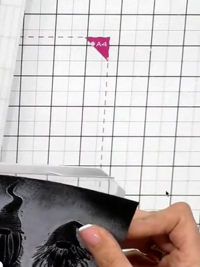 Step 1: Trim your stamped or printed Christmas gnome design to fit within the four-by-six inch Infinity Window dimensi