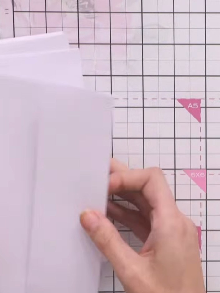 Step 1: Gather several envelopes and apply glue to the flap of the first envelope. Insert the glued flap inside anothe