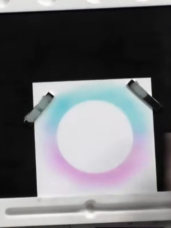 Step 1: Select a background stamp featuring a circle design and stamp it onto white card. The example shows a gradient