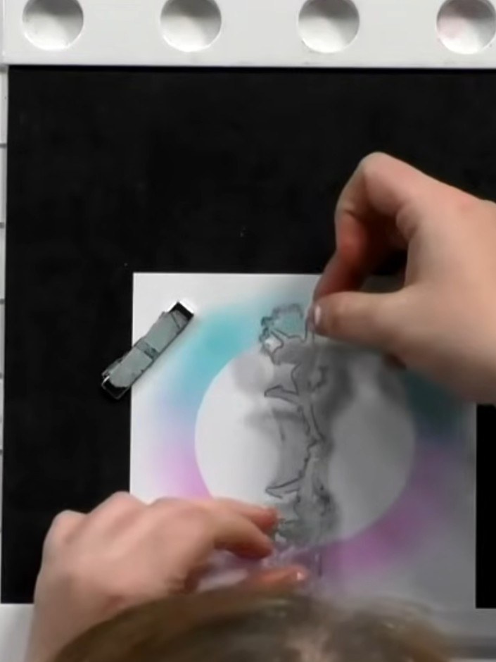 Step 3: Apply black ink fully over the top dancer stamp image to create a solid silhouette effect. Use your ink applic