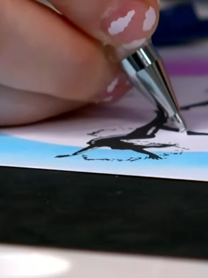 Step 9: Using a white gel pen, add highlight details to the silhouettes such as shine marks and movement lines to enha