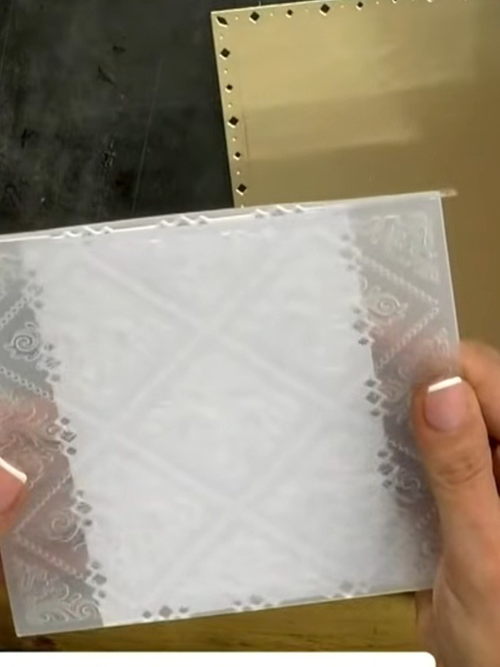 Step 2: Mount the white diamond stitch embossed panel onto black cardstock to create contrast and make the geometric p