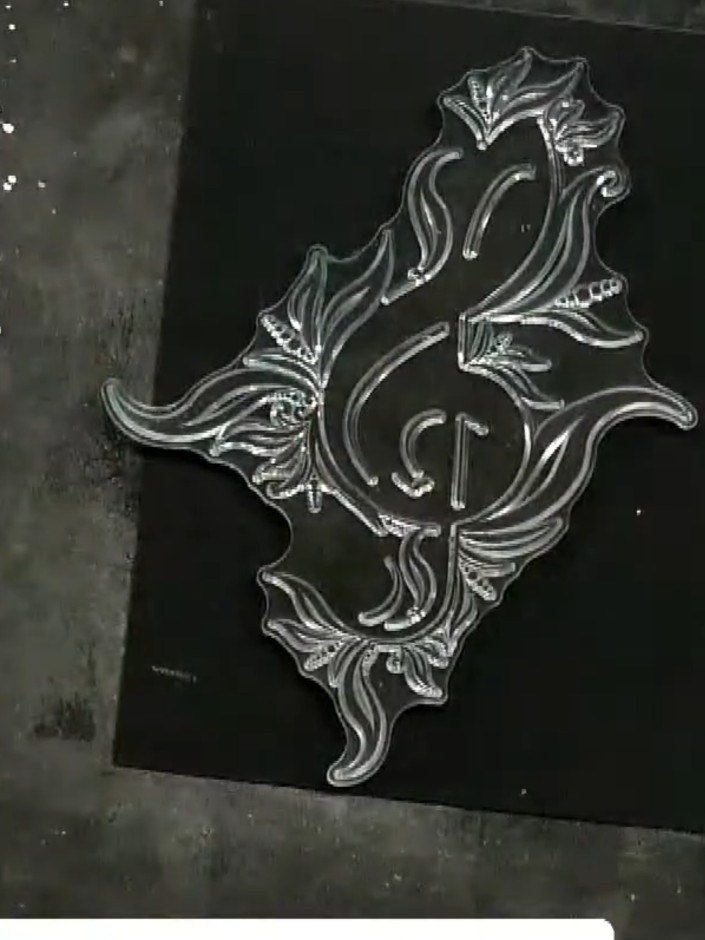 Step 2: Stamp the treble clef outline from the stamp set onto black cardstock using a sticky ink pad. Position the sta