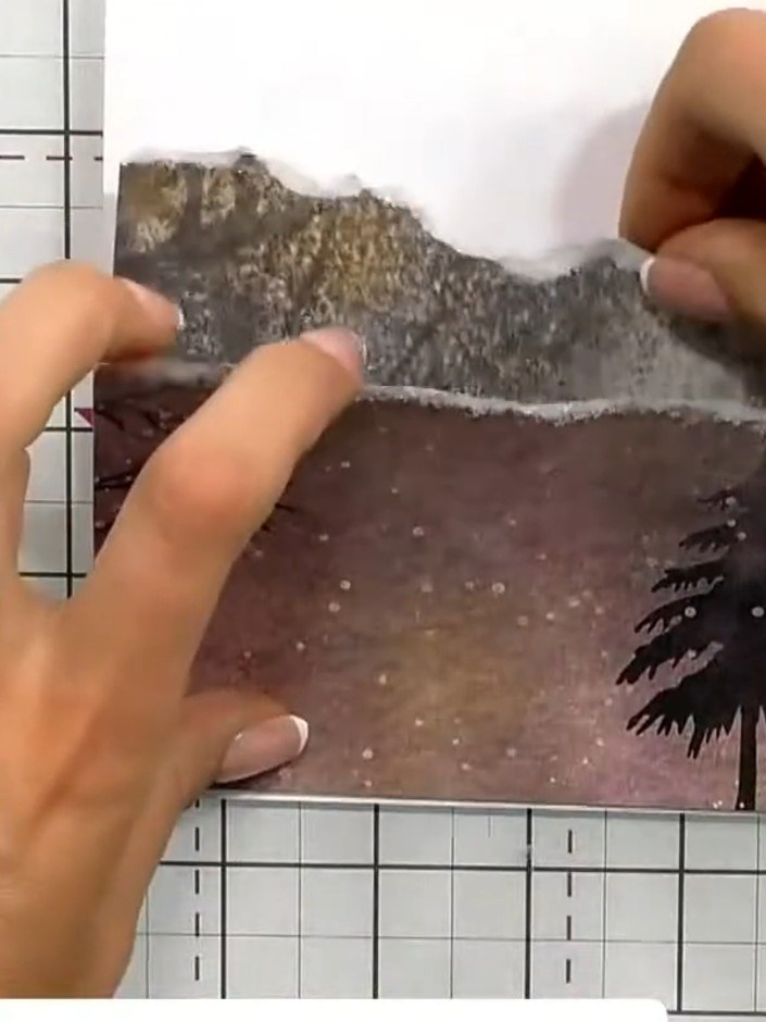 Step 5: Cut a small piece of gold cardstock and position it behind the stag decoupage piece to create a drop shadow ef