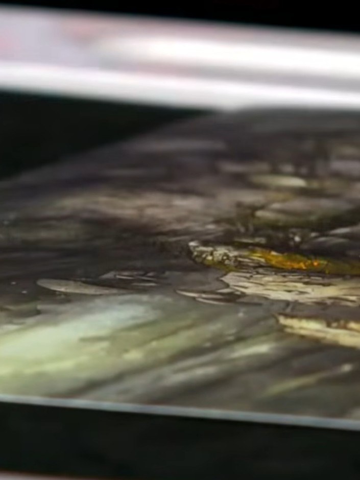 Step 8: Apply watercolour paint around the fairy image using a brush or sponge to create a dreamy, ethereal background