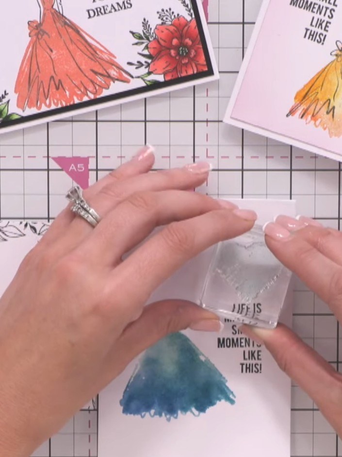 Step 10: Optionally stamp a hat image above the gown using teal ink or another colour that complements your chosen gown