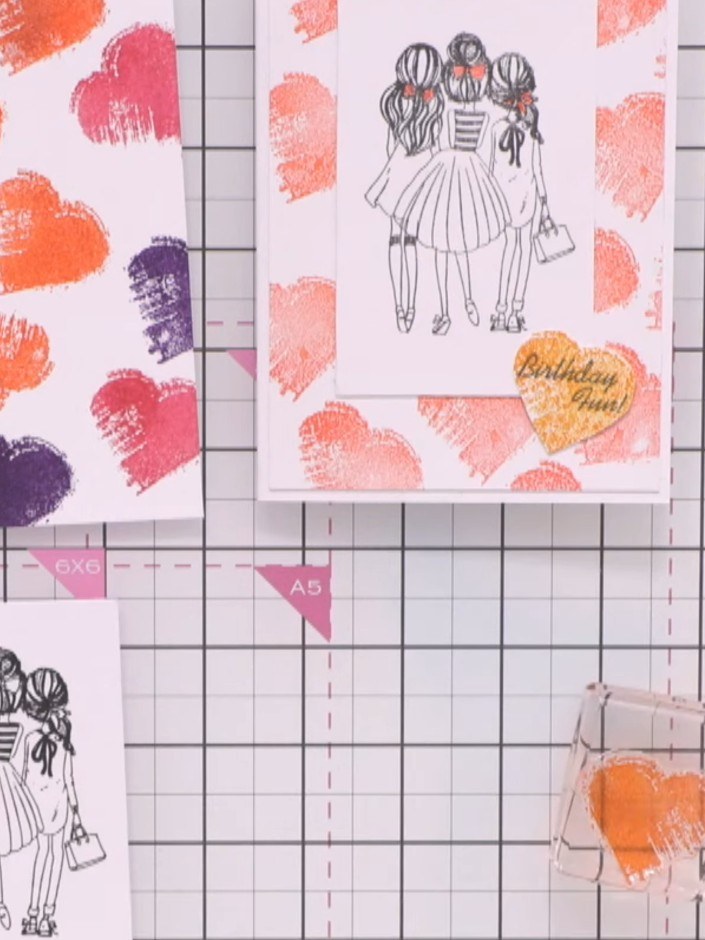 Step 10: Stamp a heart from the heart pattern paper onto the card using the Bittersweet ink to add a decorative element