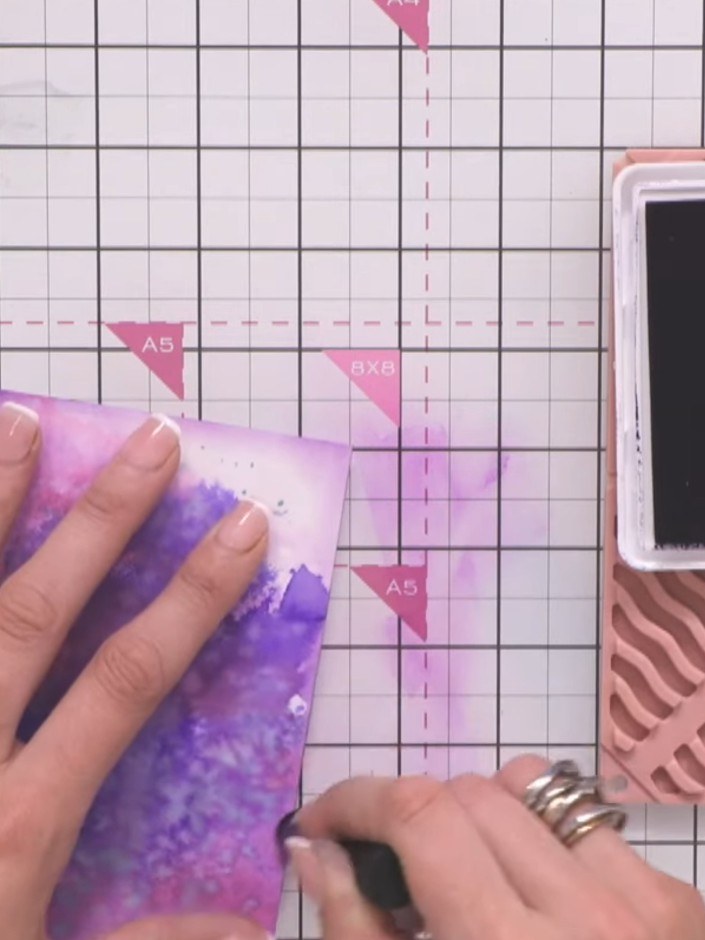 Step 3: Ink up the reflection stamp with black ink. Stamp the reflection image onto the lower portion of your moody pu