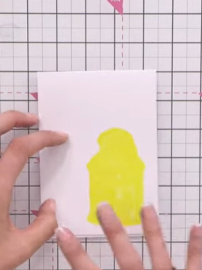 Step 5: Turn the stamp over and press the back of the stamp onto your white card to create a solid, watercolour-effect