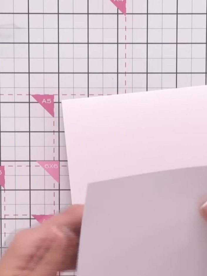 Step 1: Start with an A2 white card base. Select a coordinating patterned paper from the collection to use as your bac