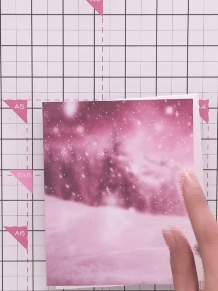 Step 2: Position the pink sparkly patterned paper onto the front of your A6 card base. Smooth it down carefully to adh
