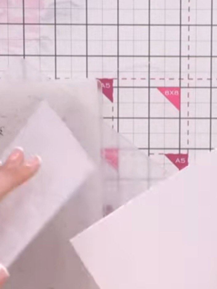 Step 1: Run white cardstock through the embossing machine using the Timber embossing folder with the thickest plate sa