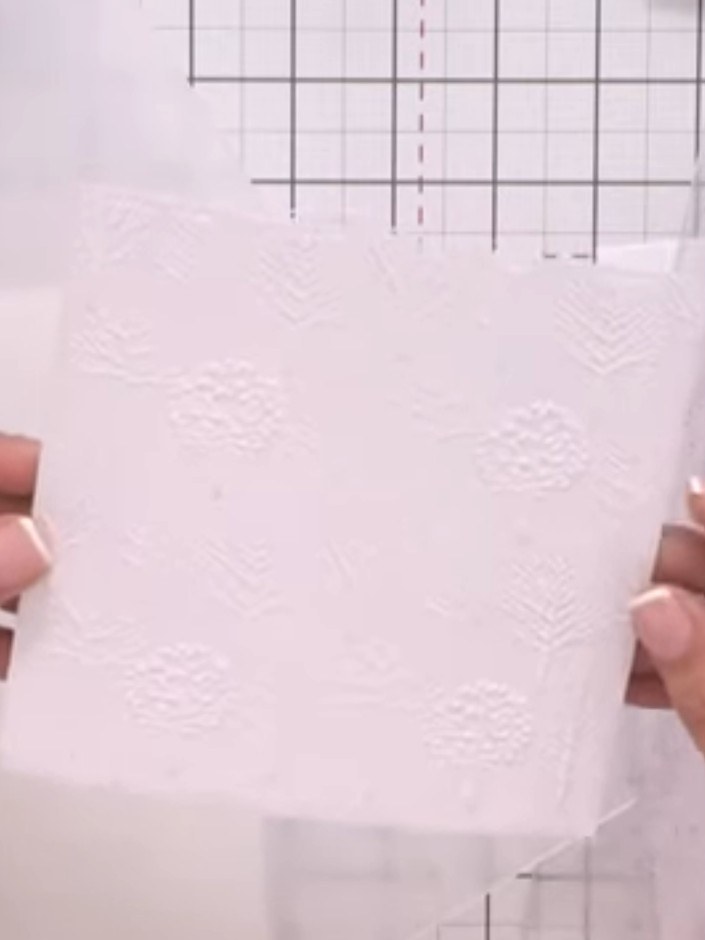Step 2: Run a second piece of white cardstock through the Autumn Breeze embossing folder to create an embossed backgro