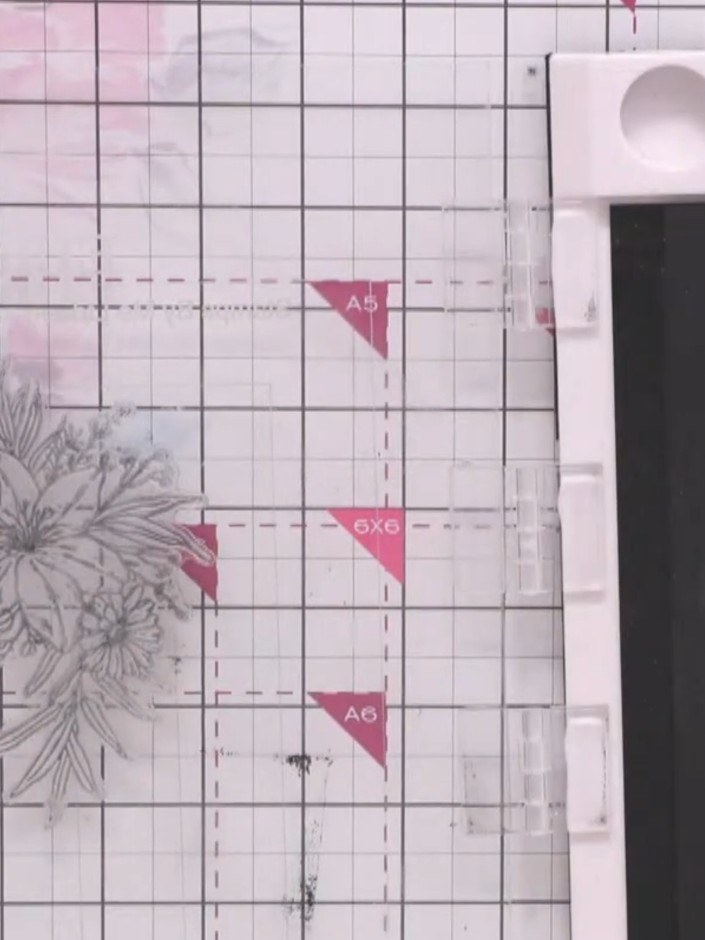 Step 6: Die-cut the embossed floral design using the coordinating dies from the Stamps By Me set. Carefully position t