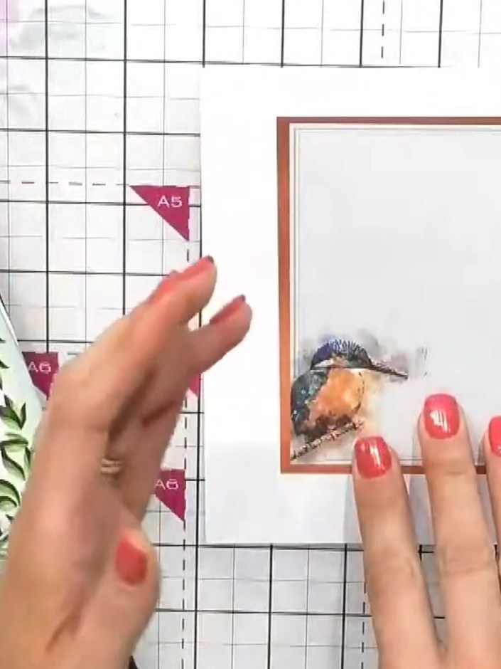 Step 5: Colour the fussy-cut flowers from the Garden Florals topper sheet in yellow and orange tones to complement the