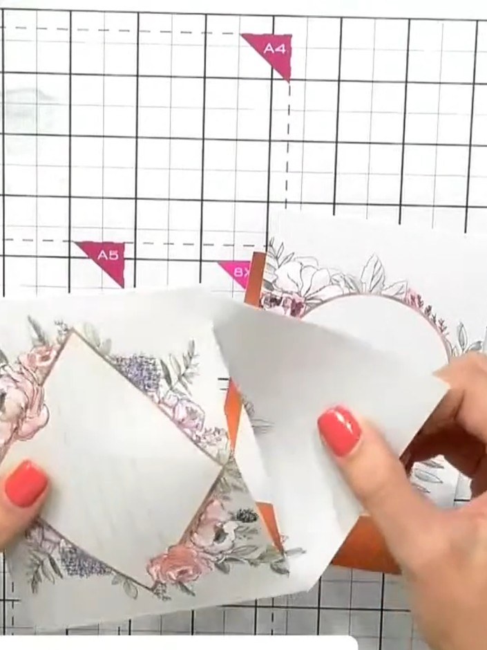 Step 2: Cut a slit into the top edge of the envelope using scissors to create an opening for the sliding pocket elemen