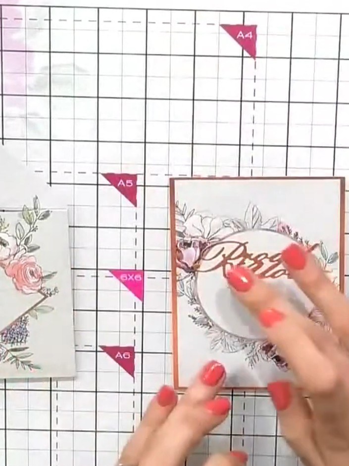 Step 6: Die-cut a sentiment word such as 'Proud of You' from rose gold glitter cardstock. Position the die-cut sentime