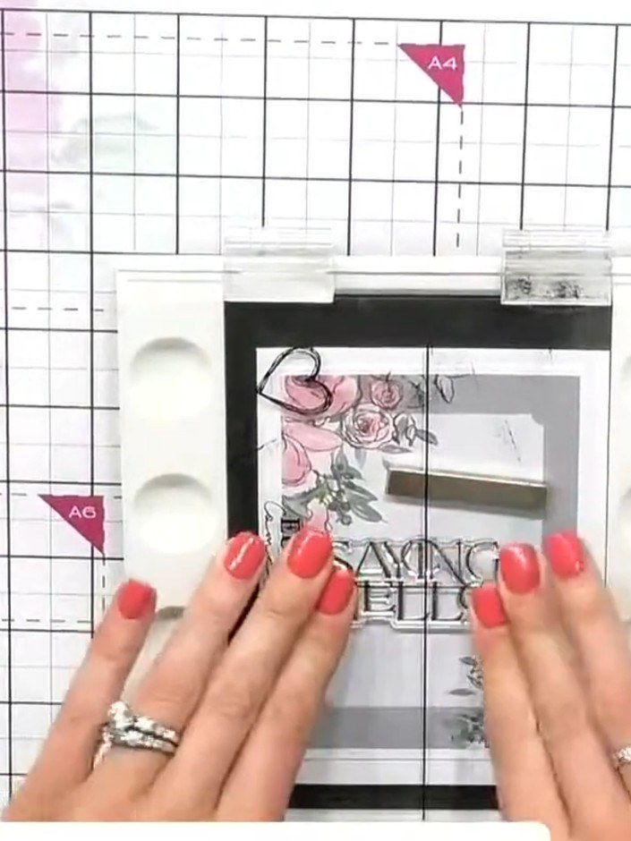 Step 6: Add another fussy-cut floral element from the Charcoal Roses toppers to the opposite corner of the card for ba