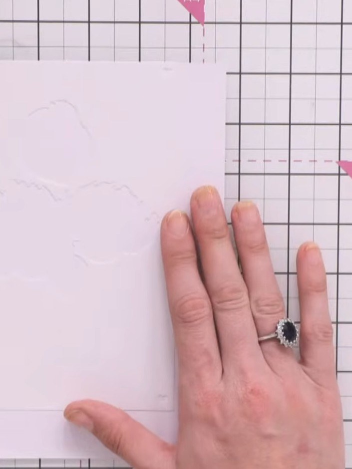 Step 1: Start with stencil number one and tap off excess ink from your brush. Apply ink through the stencil onto white