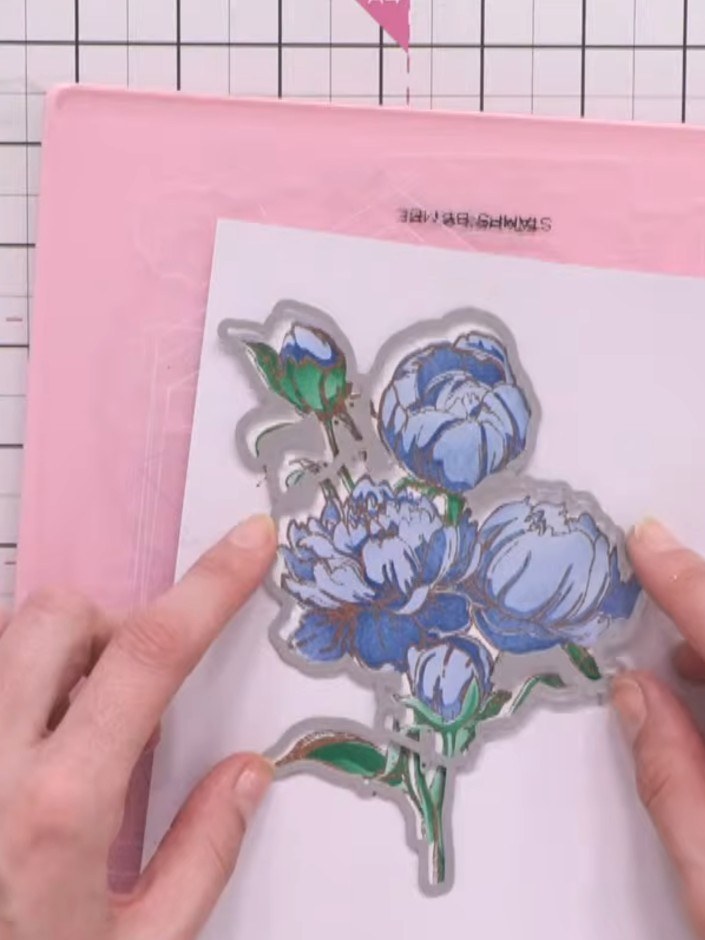 Step 7: Die-cut your heat embossed peony using the coordinating outline die, carefully lining it up with the stamped d