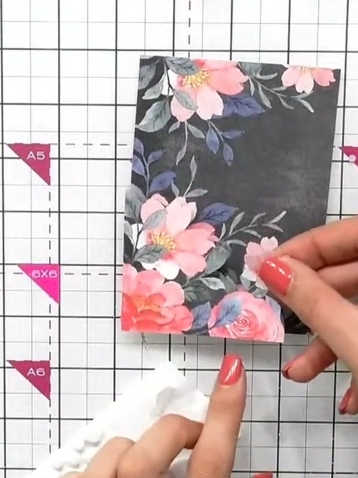 Step 3: Take a second topper from the collection and carefully fussy-cut around some of the outer floral elements to c
